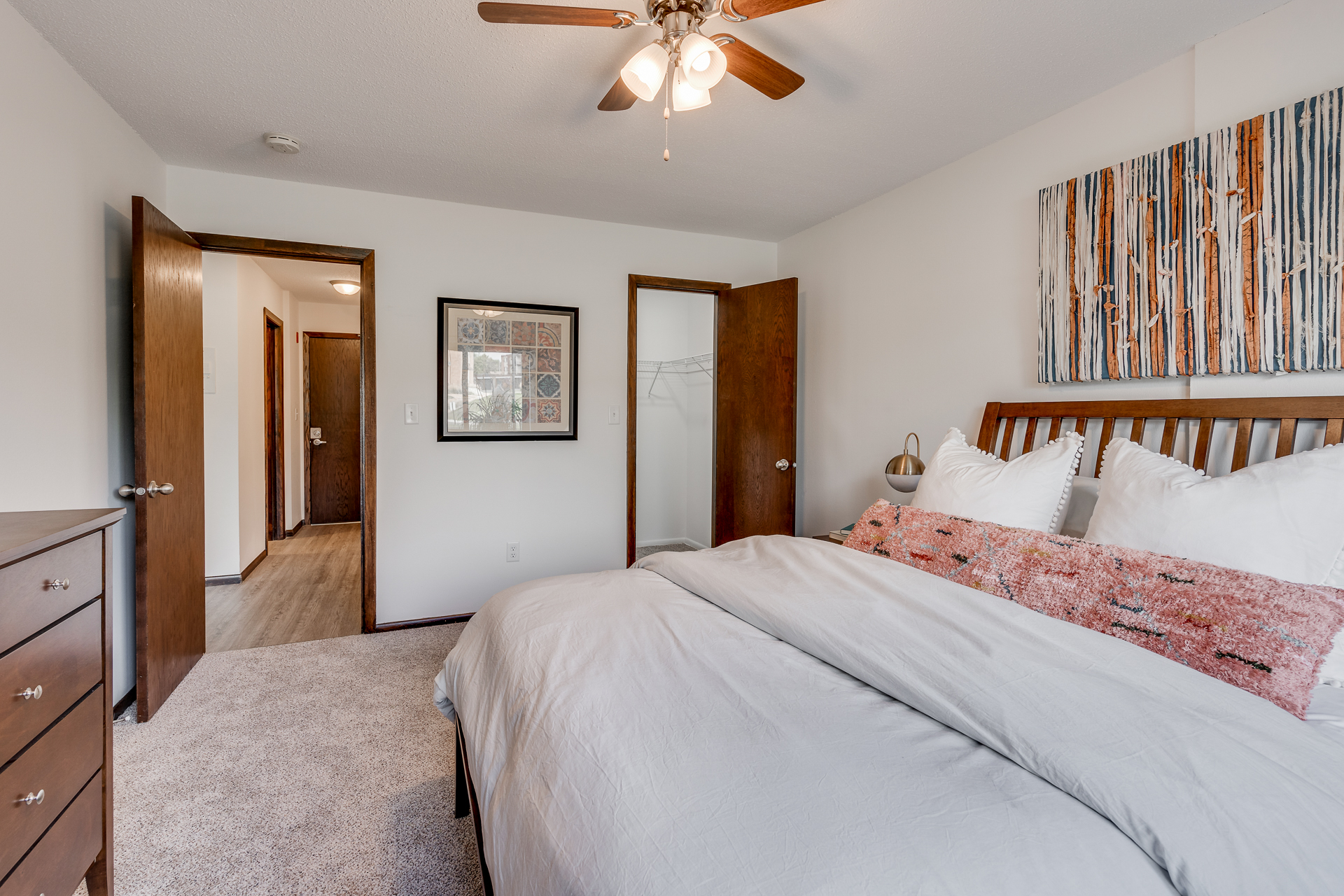 Carpeted Bedrooms And Spacious Closets At Sumter Green Apartments In Crystal, MN