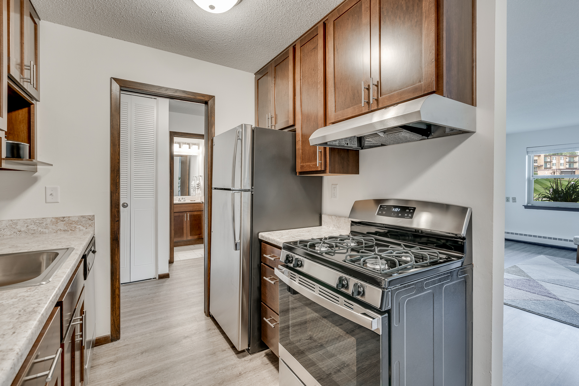 Stainless Steel Appliances In Kitchens At Sumter Green Apartments In Crystal, MN