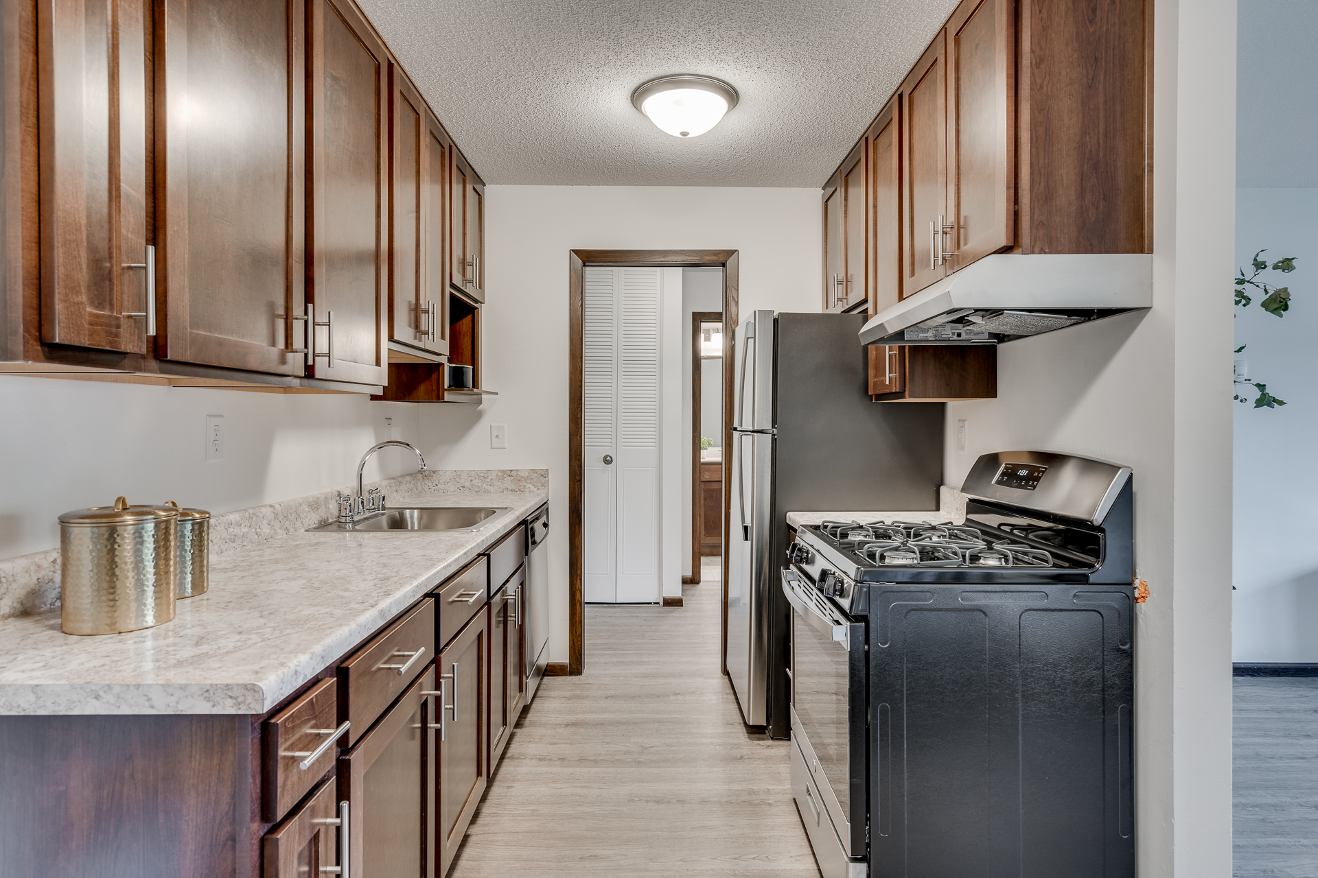 Gas Stoves In Kitchens At Sumter Green Apartments In Crystal, MN