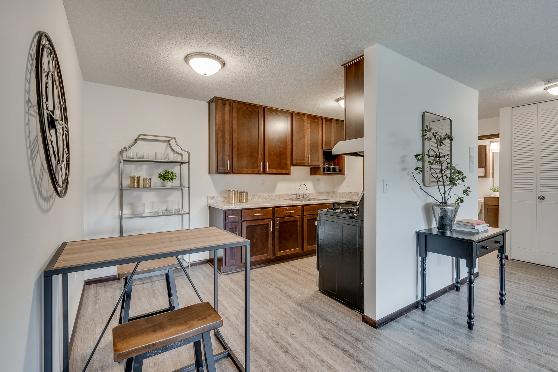 Dining Room And Kitchen At Sumter Green Apartments In Crystal, MN