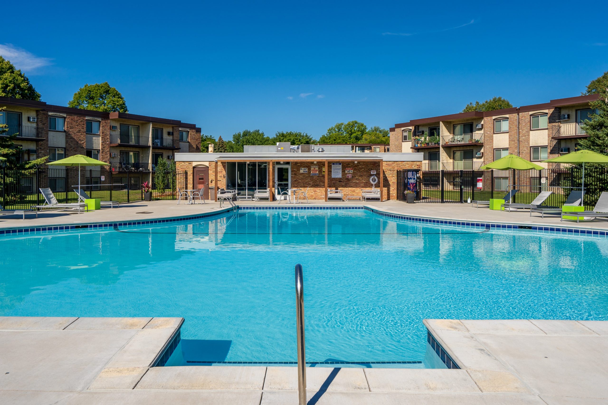 Outdoor Pool At Sumter Green Apartments In Crystal, MN