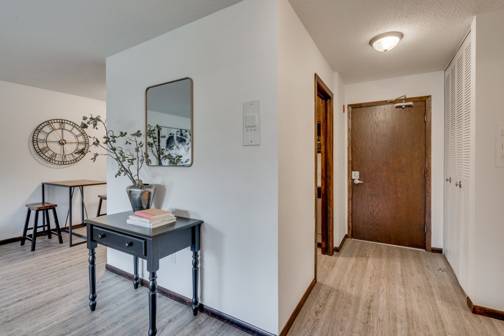 Apartment Entry Way At Sumter Green Apartments In Crystal, MN