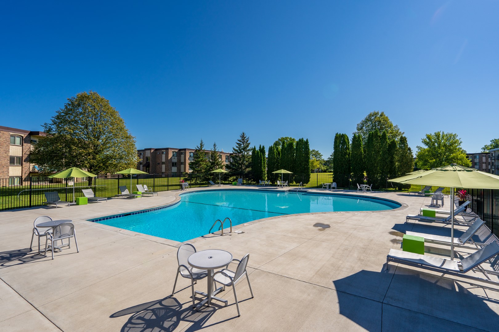 Sundeck And Pool At Sumter Green Apartments In Crystal, MN